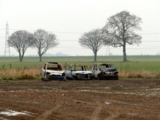 Photo 6x4 Burnt out cars at